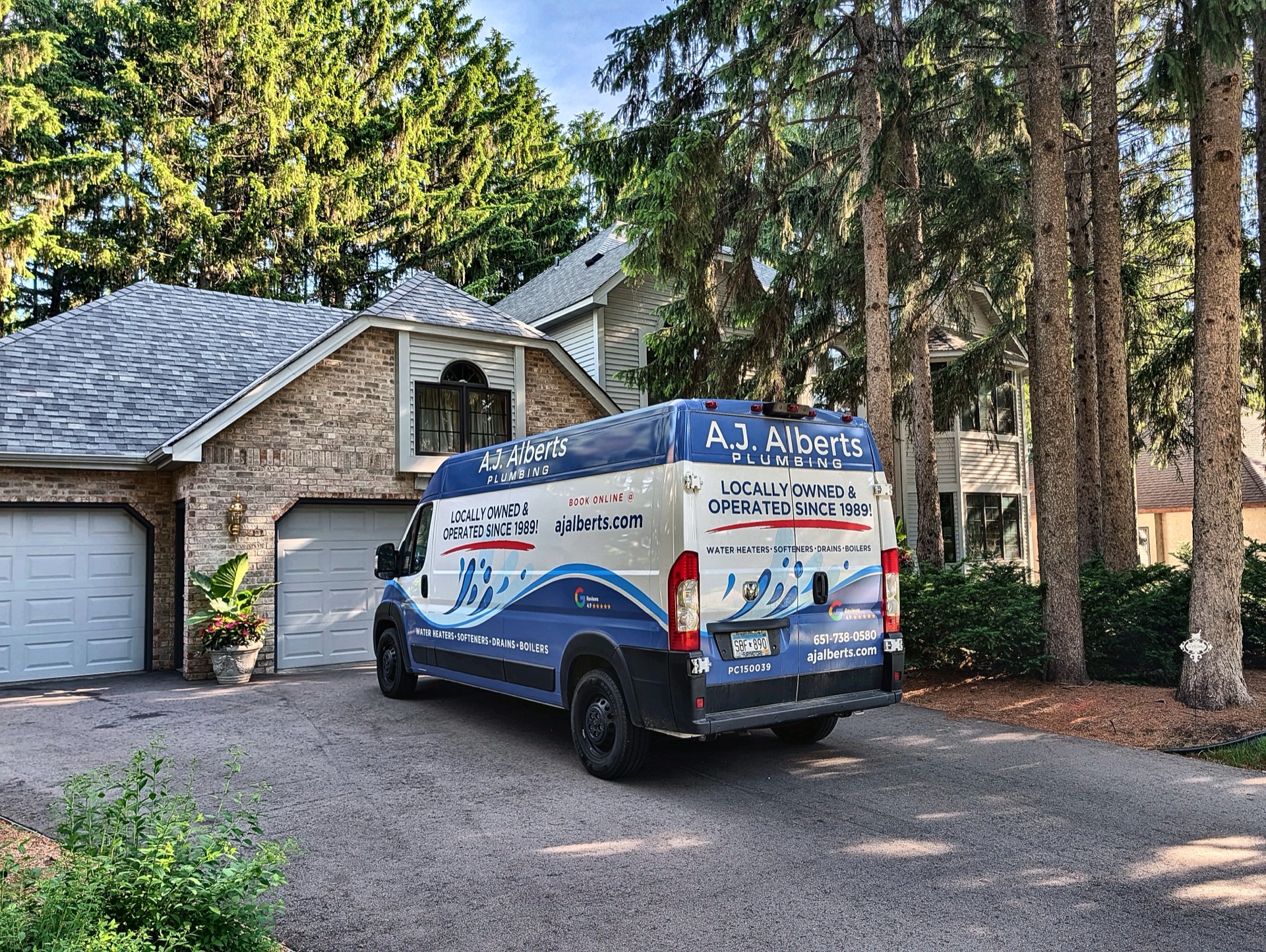 A.J. Alberts Plumbing service van at a Twin Cities home, locally owned and operated since 1989